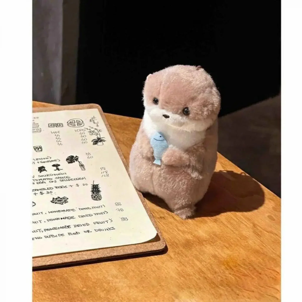Otter Hugging Fish Plush