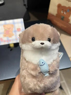 Otter Hugging Fish Plush